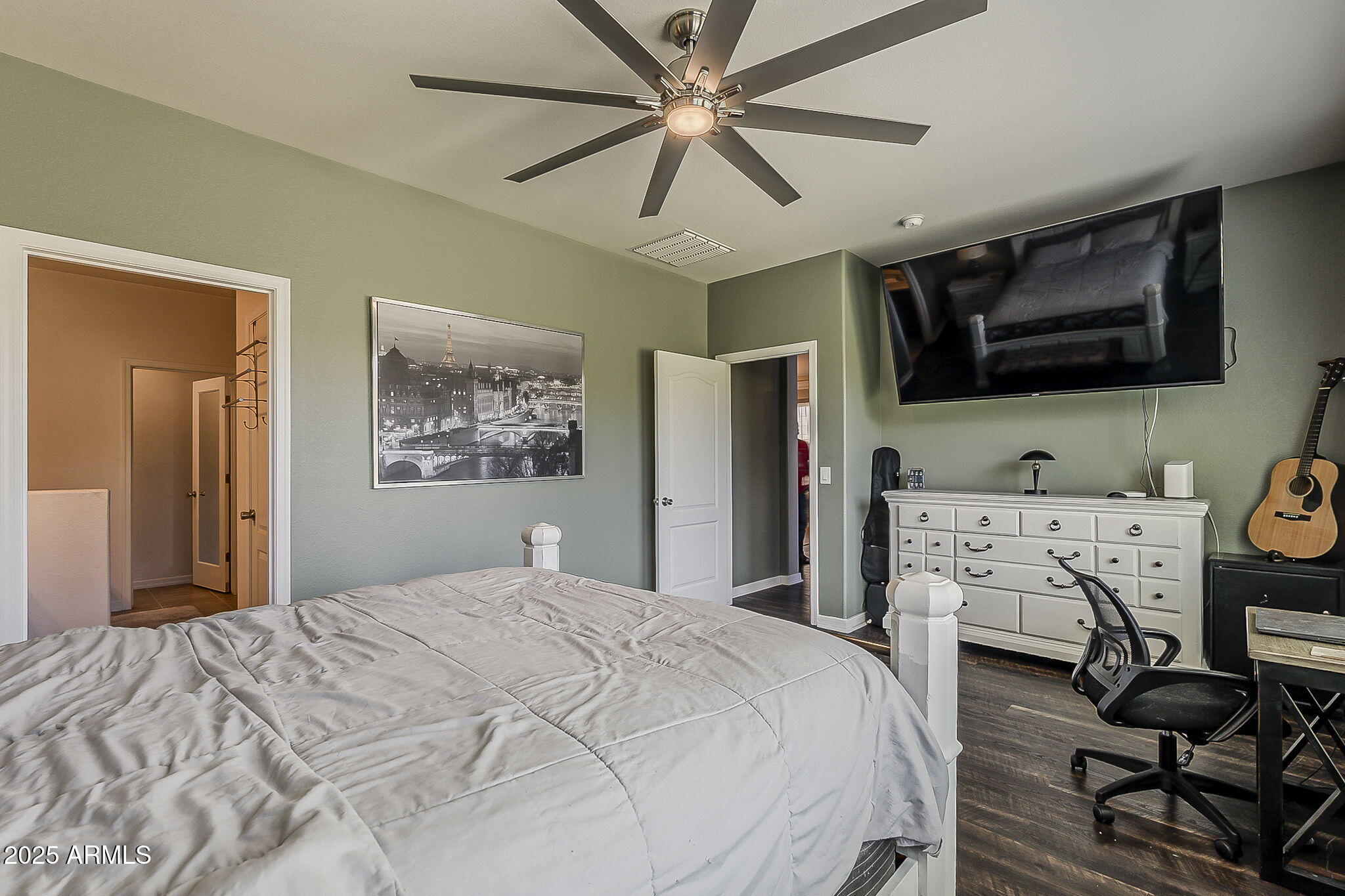 4407 West Crescent Road San Tan Valley, AZ 85144 - Photo 23 of 50 a bedroom with a bed and a flat screen tv