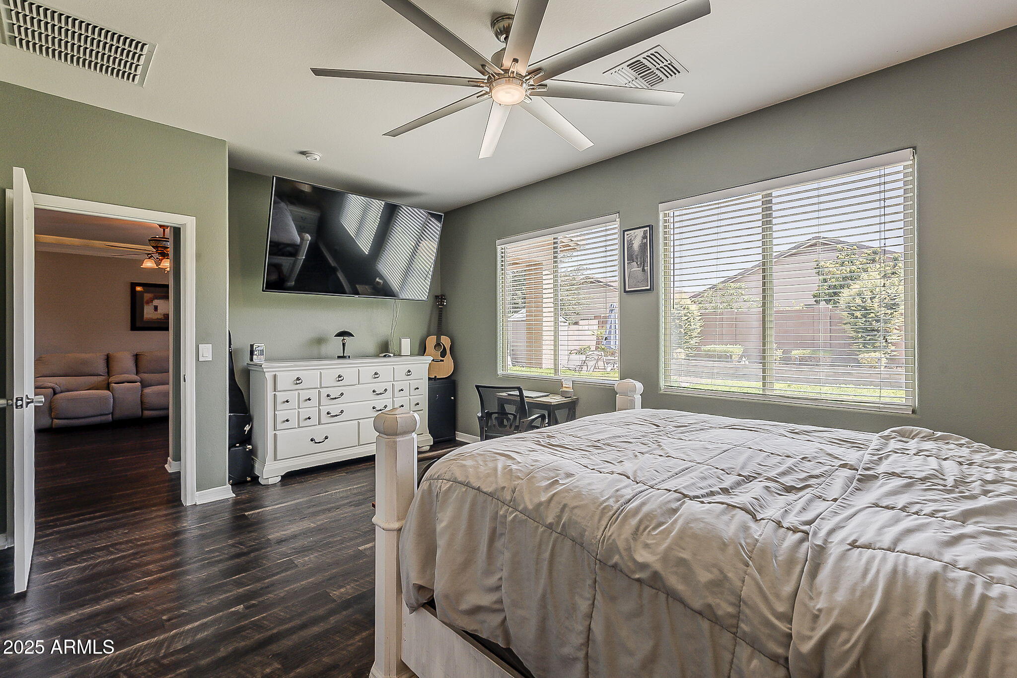 4407 West Crescent Road San Tan Valley, AZ 85144 - Photo 24 of 50 a bedroom with a bed a large window and flat screen tv