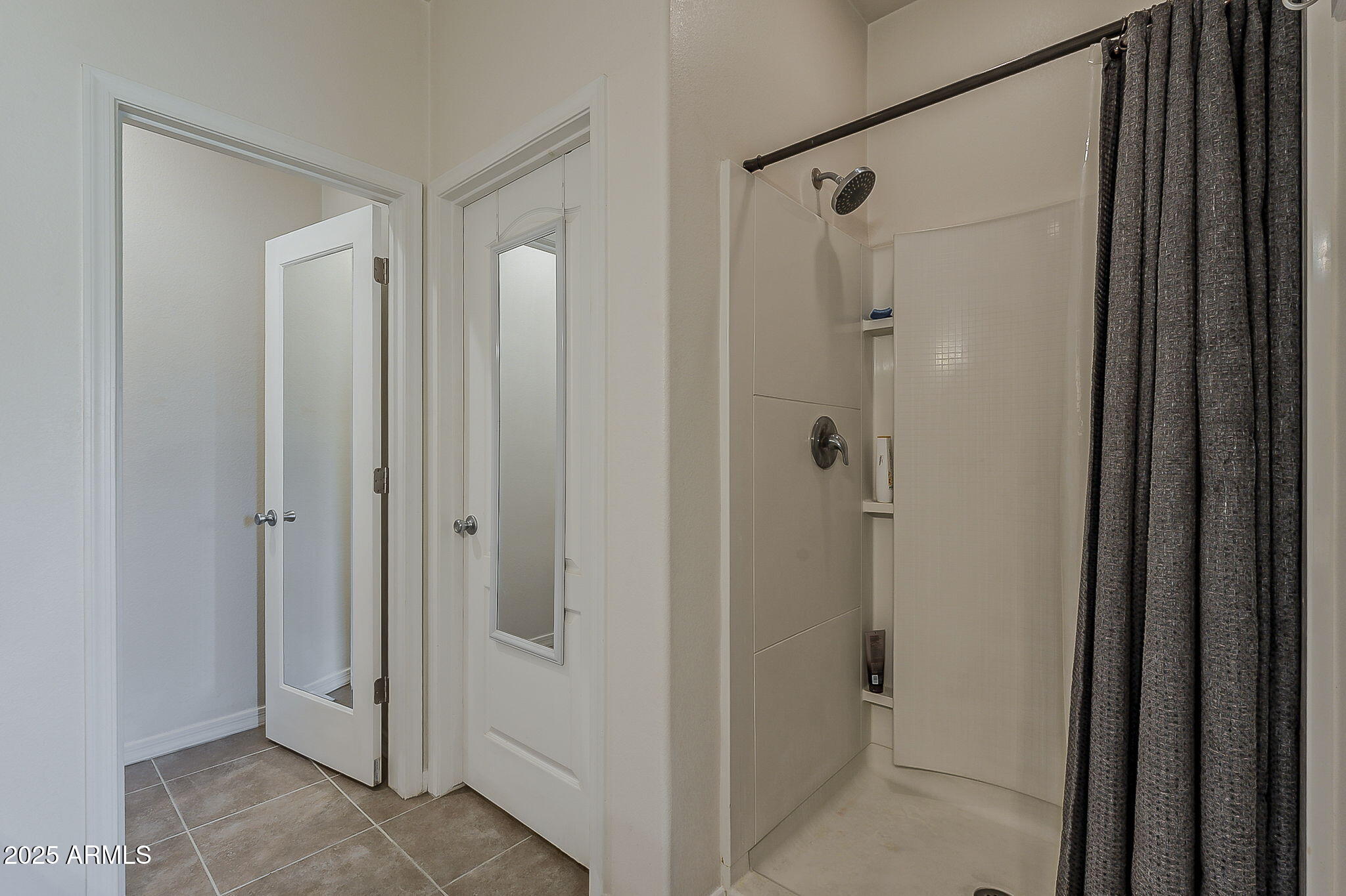 4407 West Crescent Road San Tan Valley, AZ 85144 - Photo 27 of 50 a view of a bathroom from a hallway