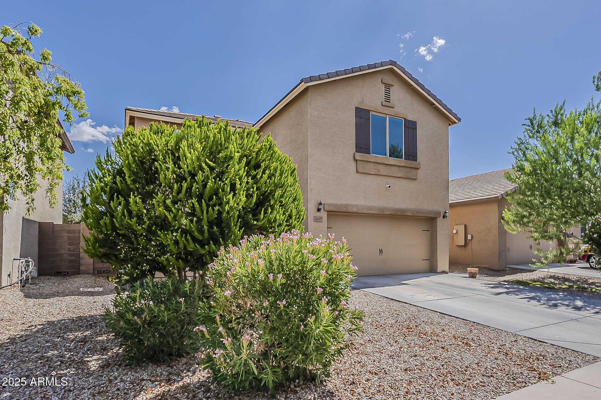 4407 West Crescent Road San Tan Valley, AZ 85144 - Photo 3 of 50 a front view of a house with a yard