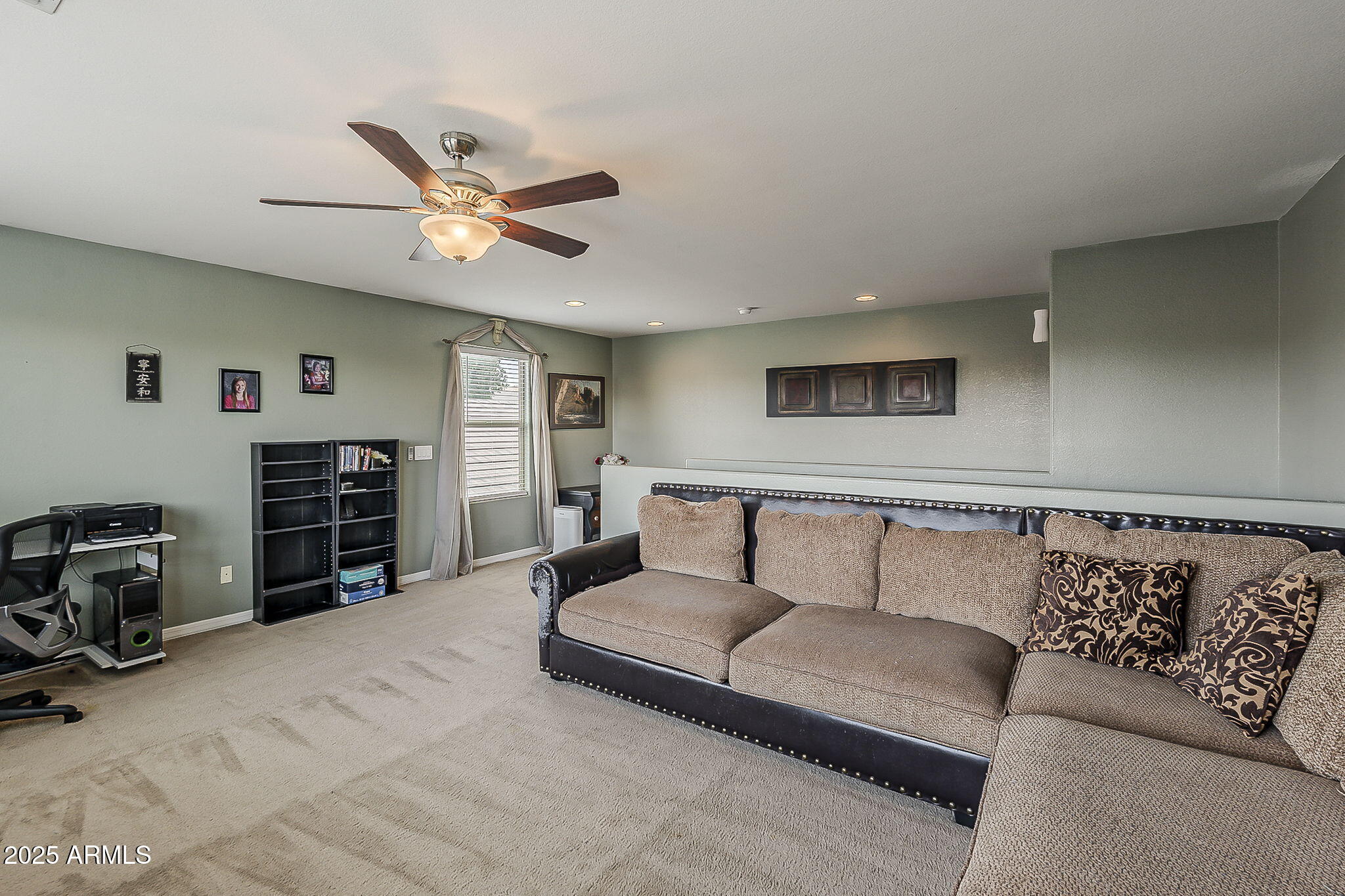 4407 West Crescent Road San Tan Valley, AZ 85144 - Photo 31 of 50 a living room with furniture and a flat screen tv