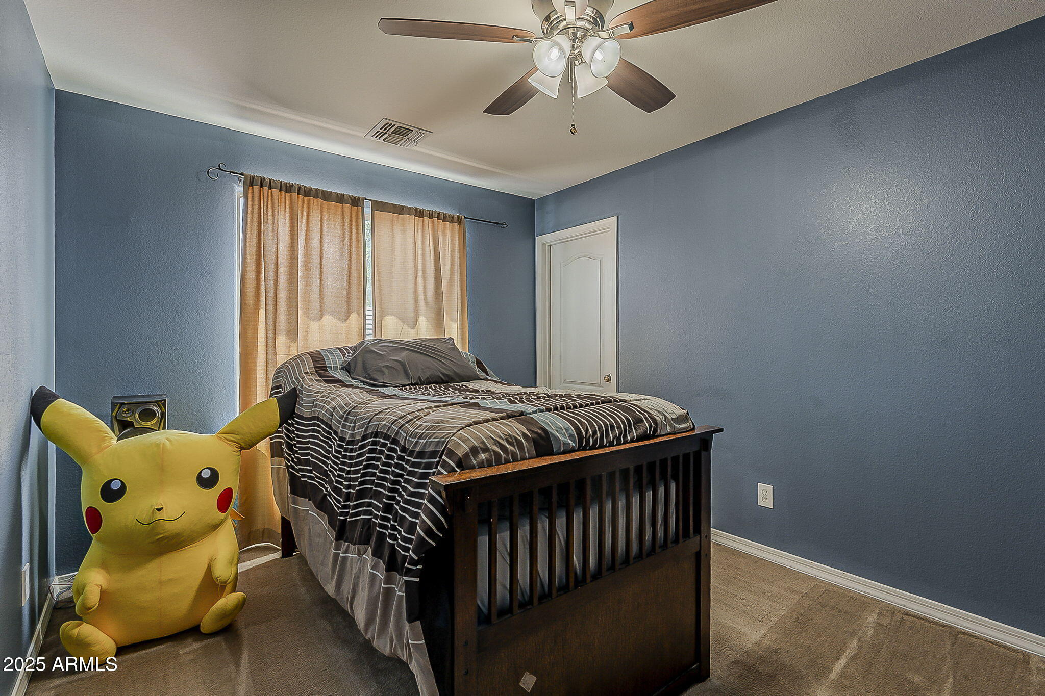 4407 West Crescent Road San Tan Valley, AZ 85144 - Photo 38 of 50 a bedroom with a bed and window