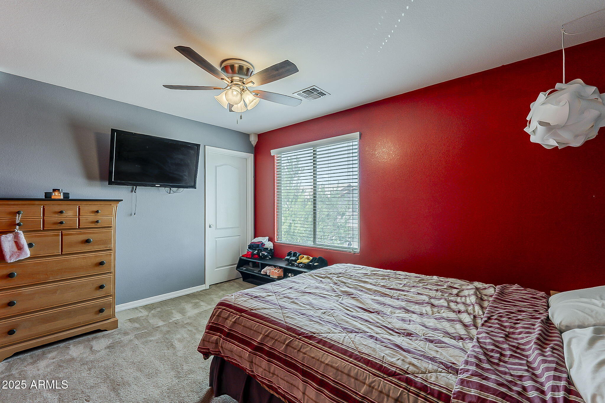 4407 West Crescent Road San Tan Valley, AZ 85144 - Photo 40 of 50 a bedroom with a bed and a flat screen tv