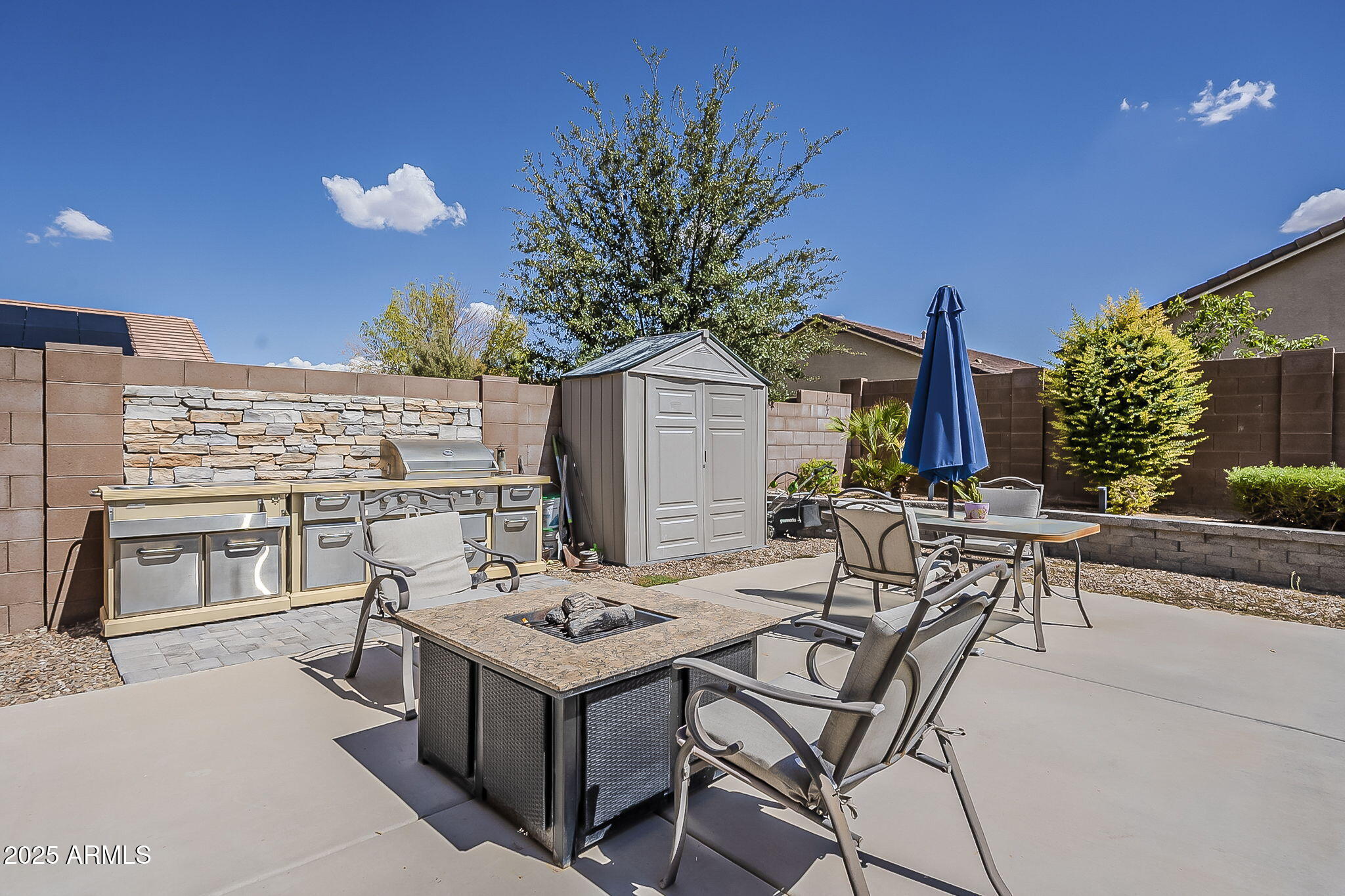 4407 West Crescent Road San Tan Valley, AZ 85144 - Photo 46 of 50 a view of a dinning table and chairs in the patio