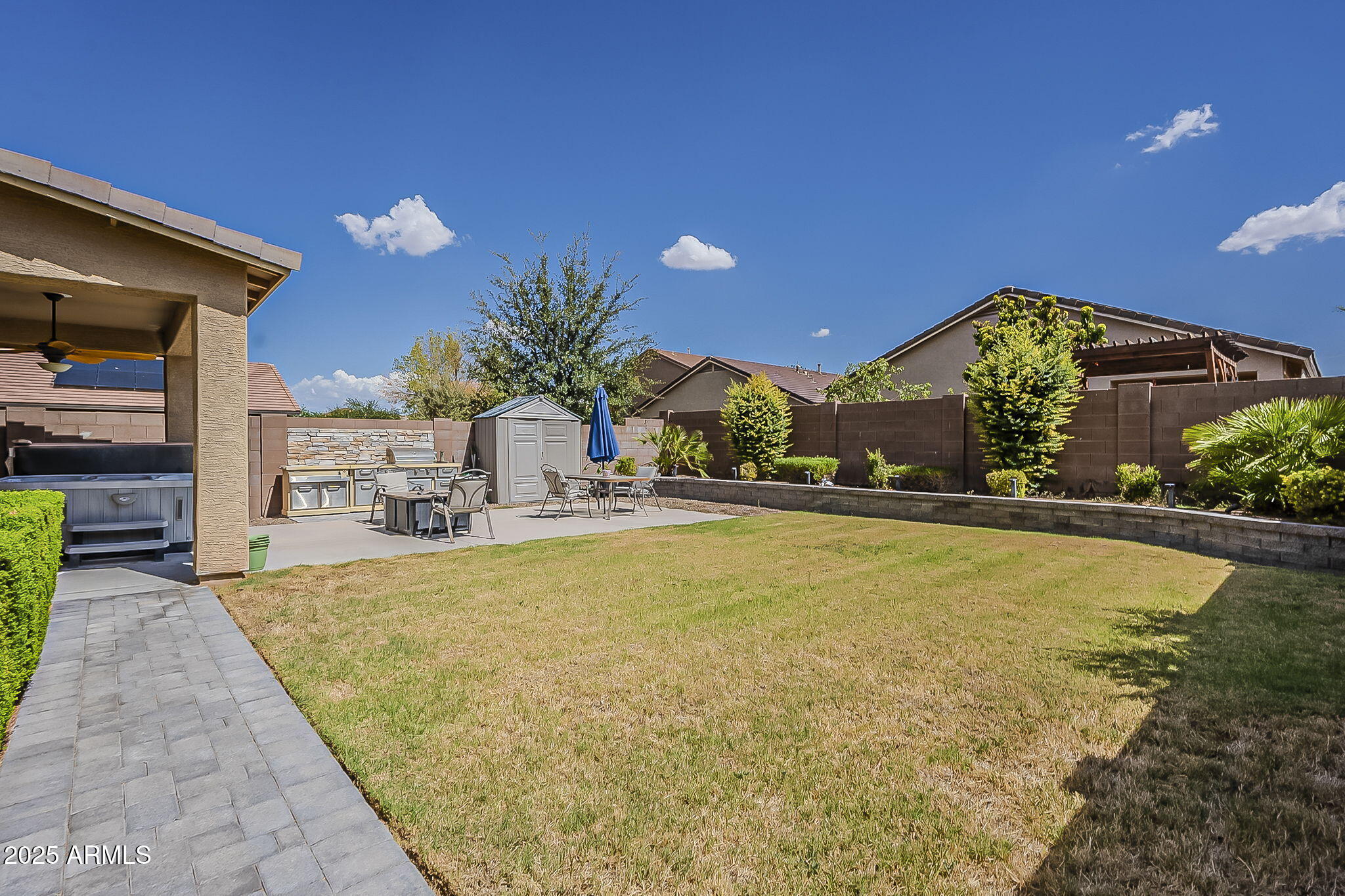 4407 West Crescent Road San Tan Valley, AZ 85144 - Photo 49 of 50 a swimming pool with outdoor seating and yard