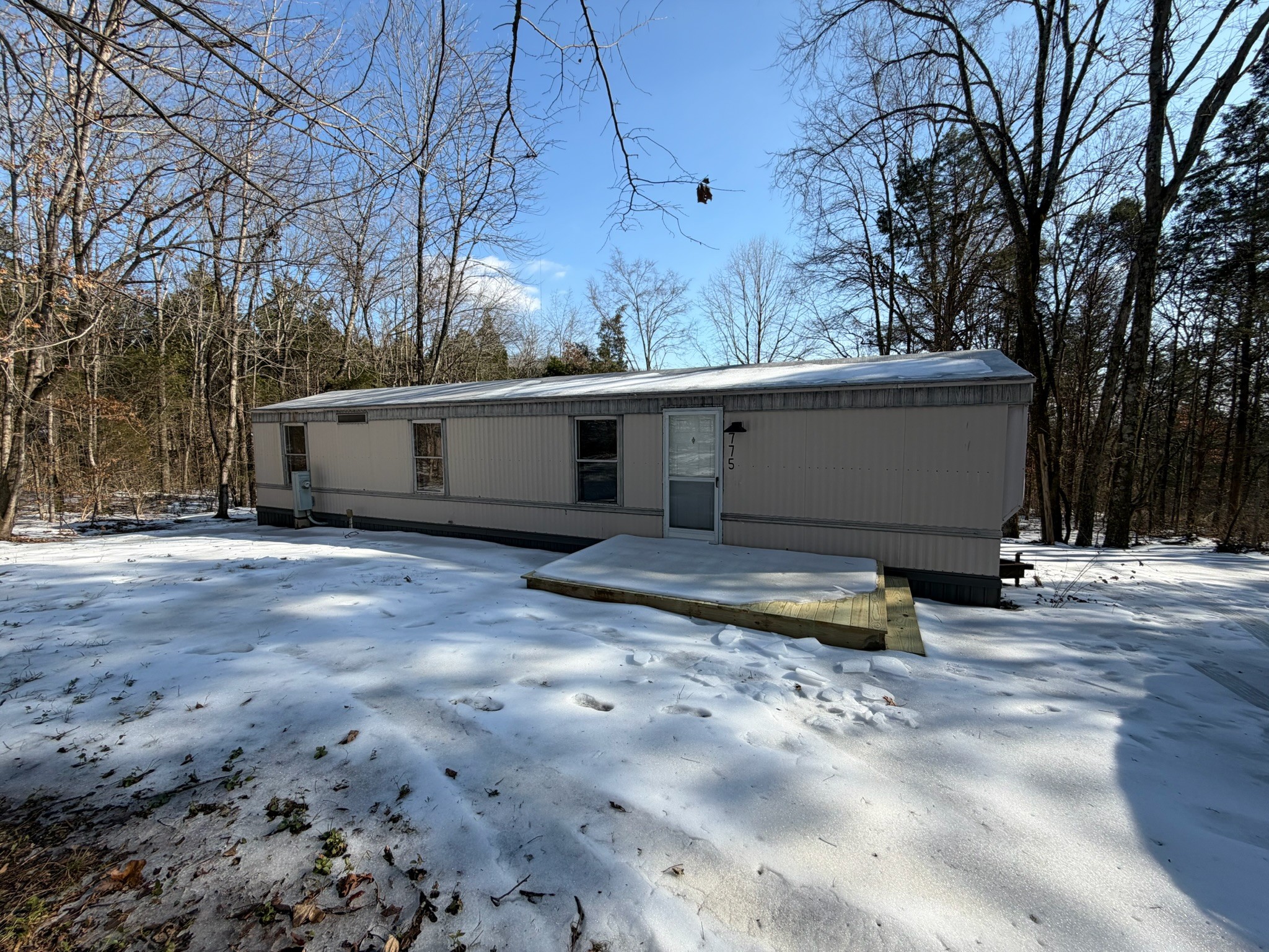 775 Slim Island Road Bowling Green, KY 42101 - Photo 1 of 17 a view of a house with backyard and trees