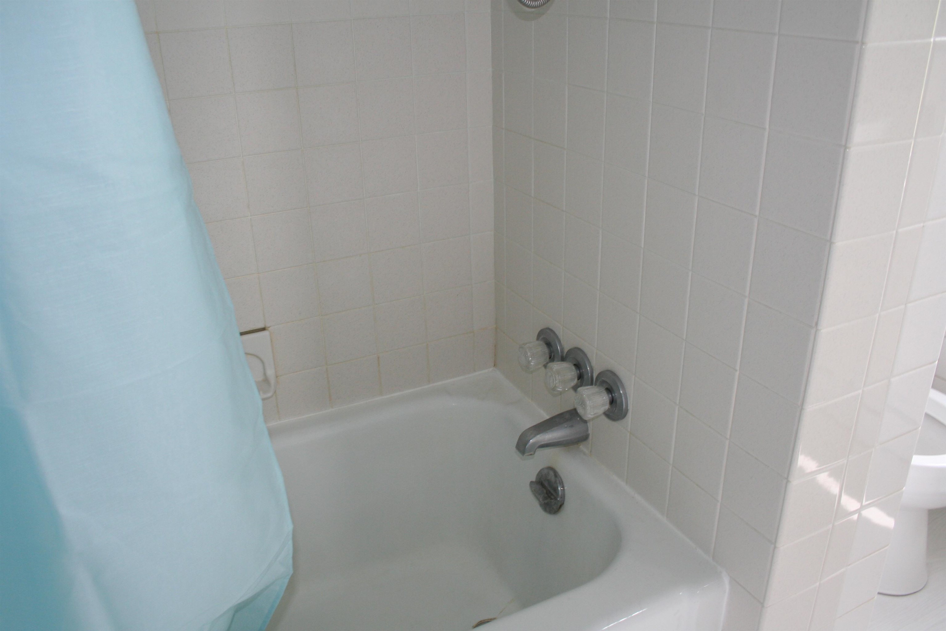 215 Potomac River Road Monterey, VA 24465 - Photo 21 of 43 a white bath tub sitting in a bathroom