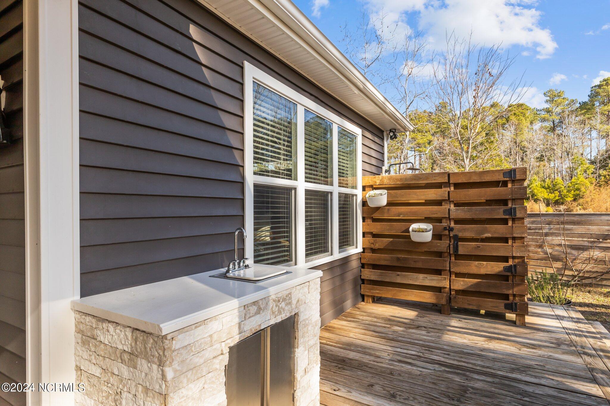 1193 Nine Foot Road Newport, NC 28570 - Photo 51 of 62 Porch sink and shower