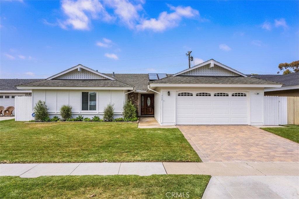 964 Lansing Lane Costa Mesa, CA 92626 - Photo 1 of 29 a front view of a house with a yard