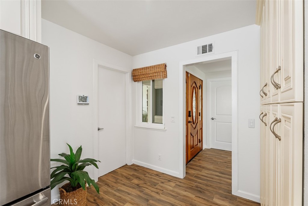 964 Lansing Lane Costa Mesa, CA 92626 - Photo 13 of 29 a view of entryway with wooden floor