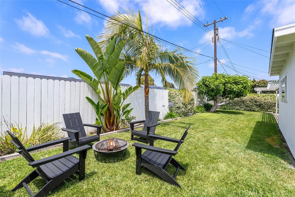 964 Lansing Lane Costa Mesa, CA 92626 - Photo 17 of 29 a swimming pool with outdoor seating and plants