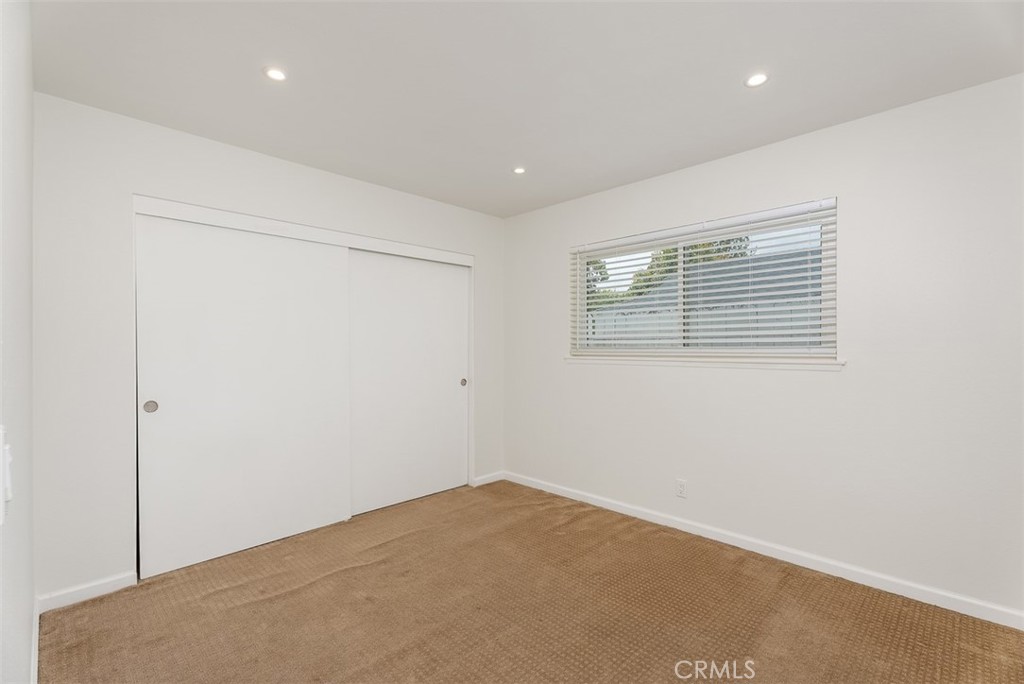 964 Lansing Lane Costa Mesa, CA 92626 - Photo 25 of 29 a view of a room with a ceiling fan
