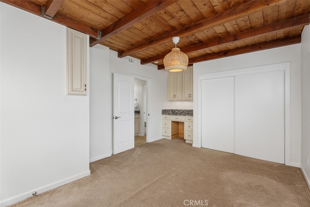 964 Lansing Lane Costa Mesa, CA 92626 - Photo 26 of 29 a view of a livingroom with a fireplace and a ceiling fan