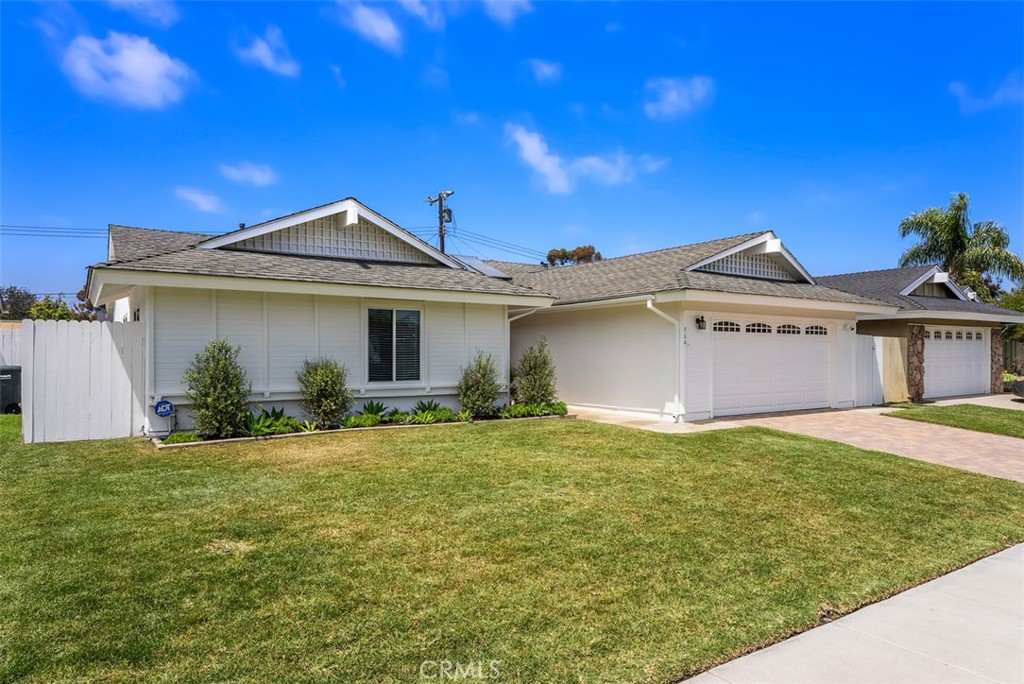 964 Lansing Lane Costa Mesa, CA 92626 - Photo 29 of 29 a front view of a house with a yard