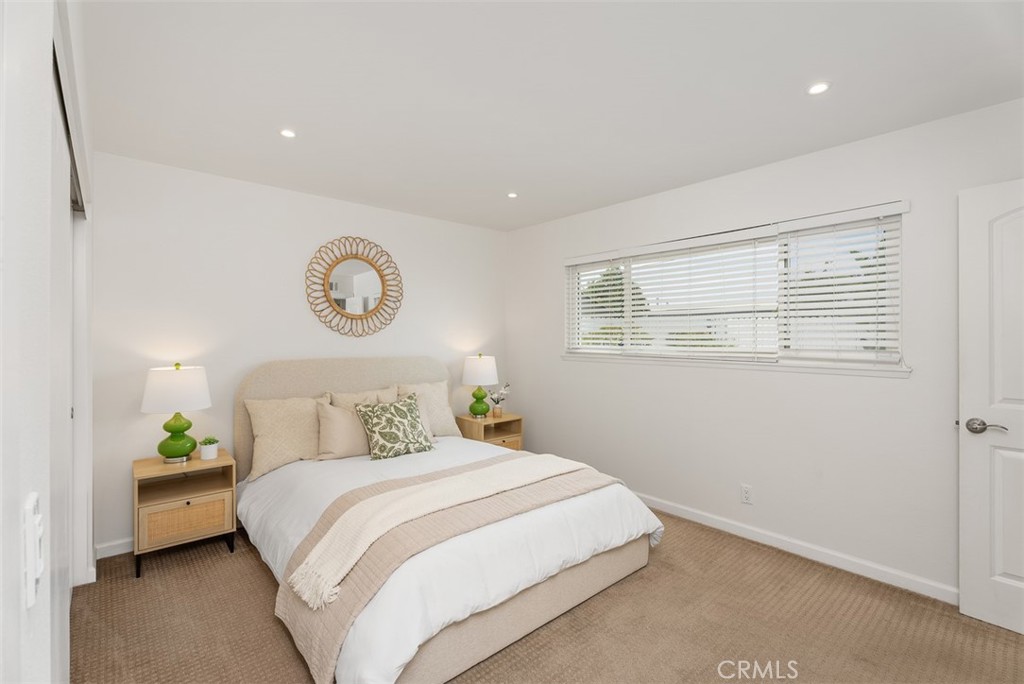 964 Lansing Lane Costa Mesa, CA 92626 - Photo 6 of 29 a bedroom with a bed and a window