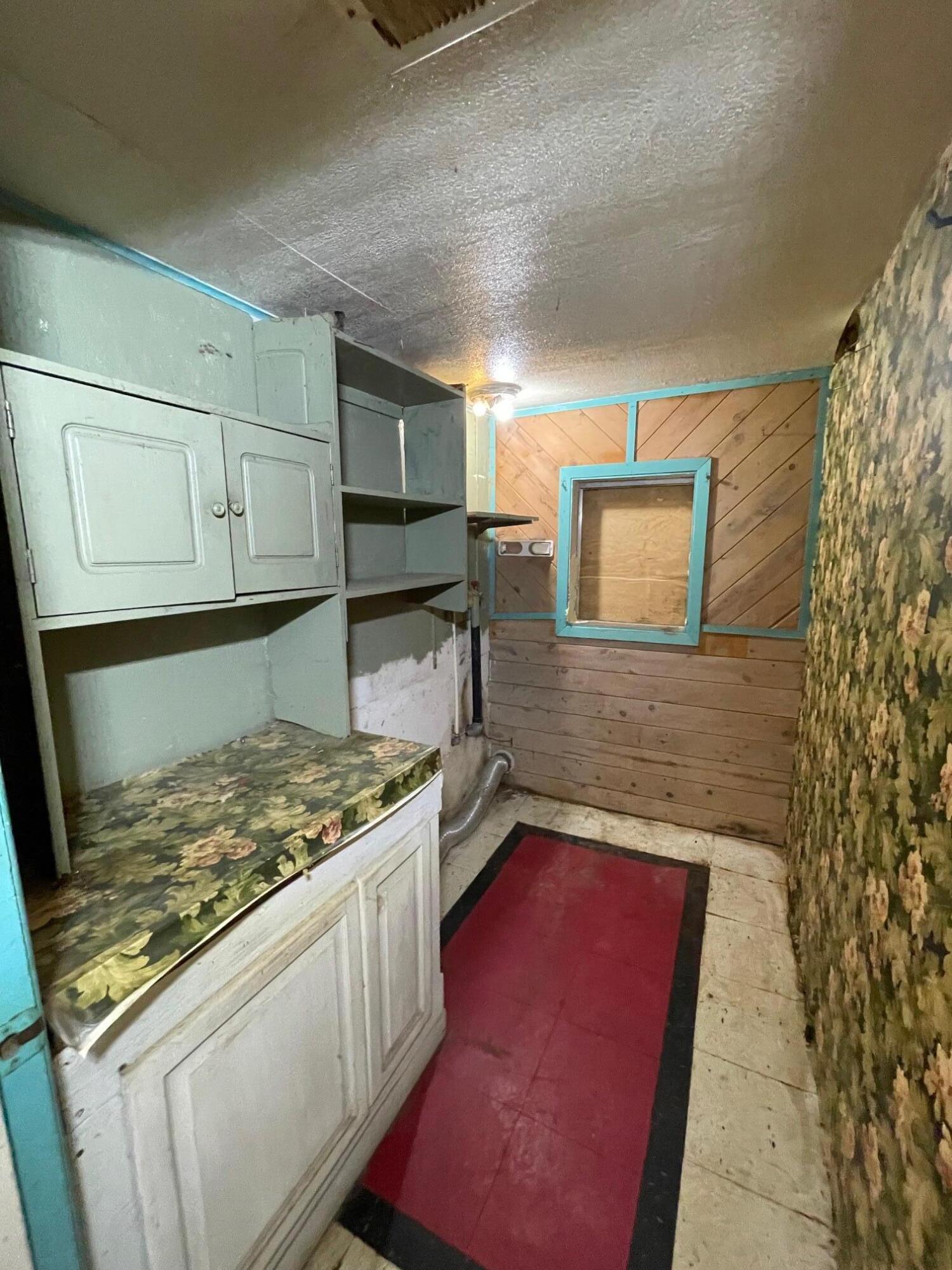 411 South Old Stage Road Cave Junction, OR 97523 - Photo 13 of 39 a kitchen with a stove and a refrigerator