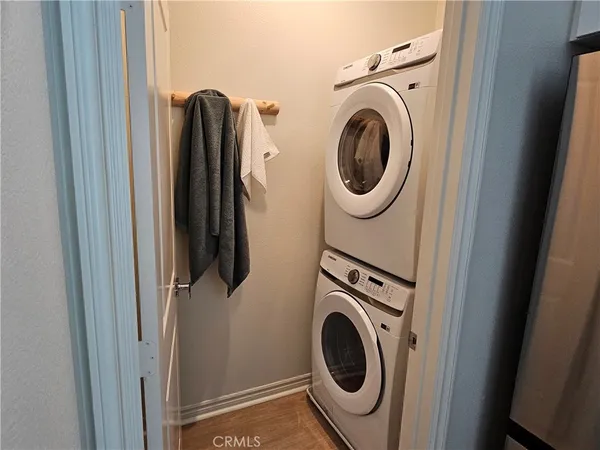 a kitchen with kitchen island a sink appliances and cabinets