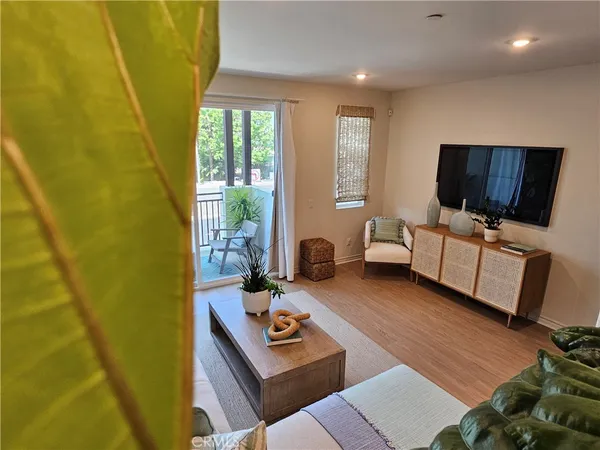 a kitchen with stainless steel appliances granite countertop a refrigerator and a stove
