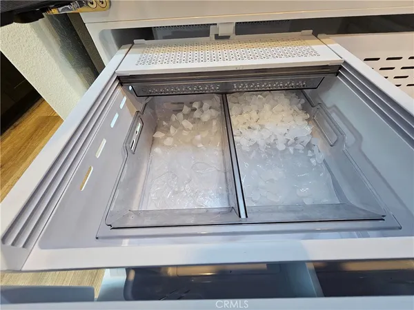 a bathroom with a toilet sink and vanity