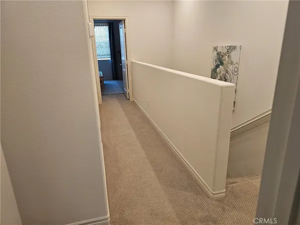 a bedroom with a bed and a view of bathroom