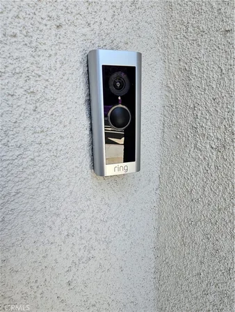 a spacious bedroom with a bed and a window