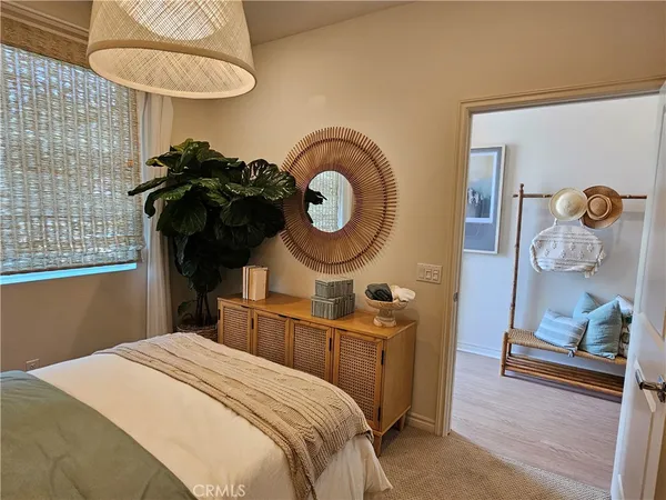 a bathroom with a shower sink and mirror