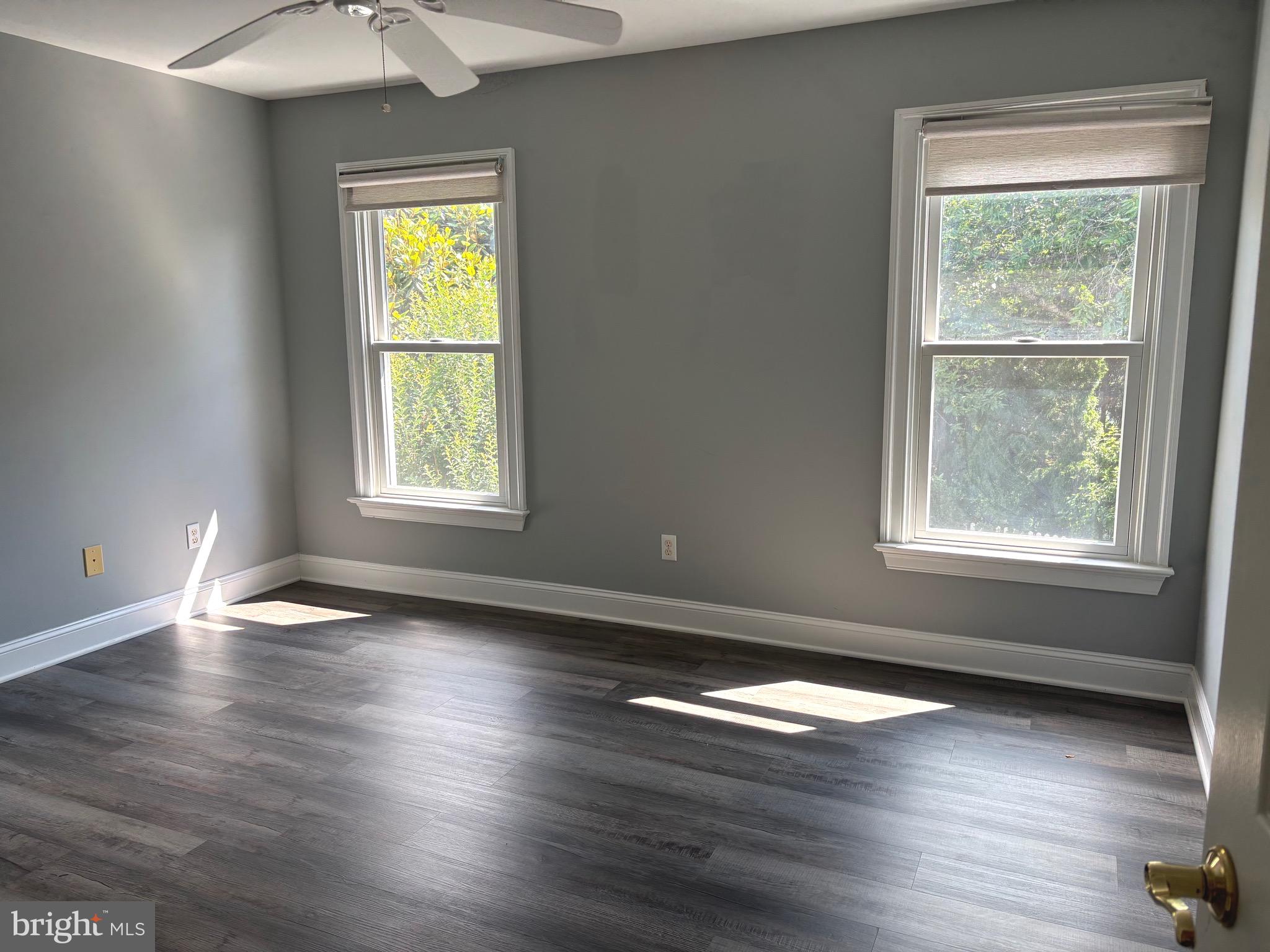 629 Country Club Road Culpeper, VA 22701 - Photo 19 of 27 a view of empty room with wooden floor and fan