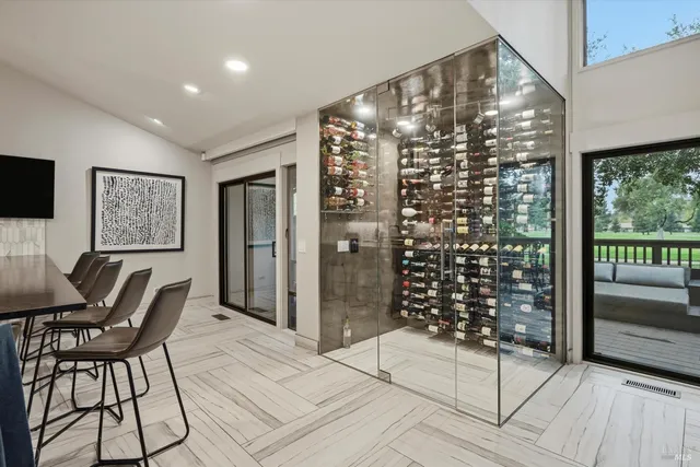 a view of a livingroom with furniture and front door