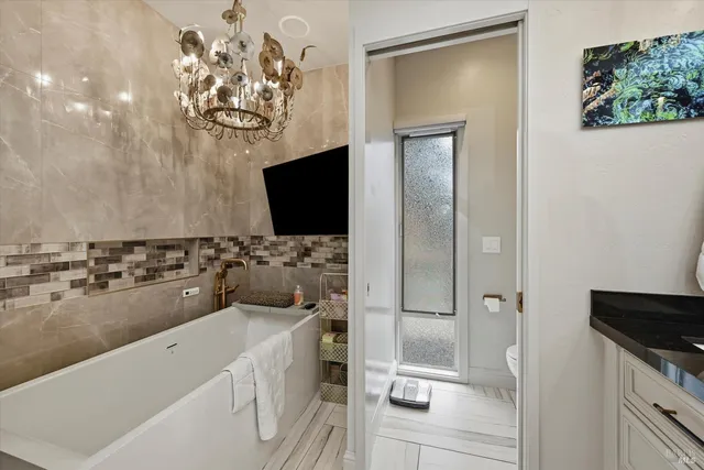 a bed room with a bed and a lamp