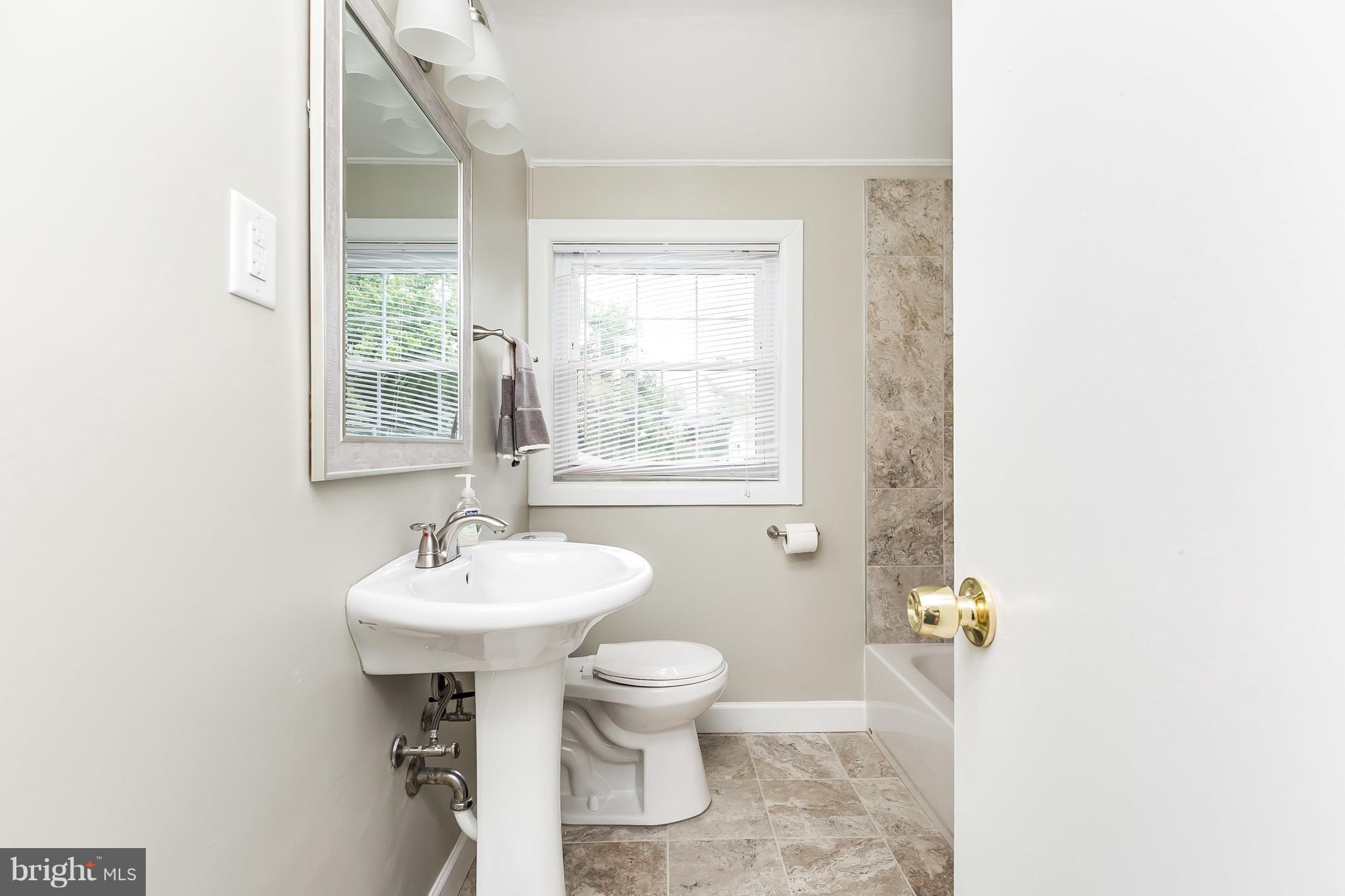917 Southridge Road Baltimore, MD 21228 - Photo 16 of 25 Beautiful bath remodeled in 2018