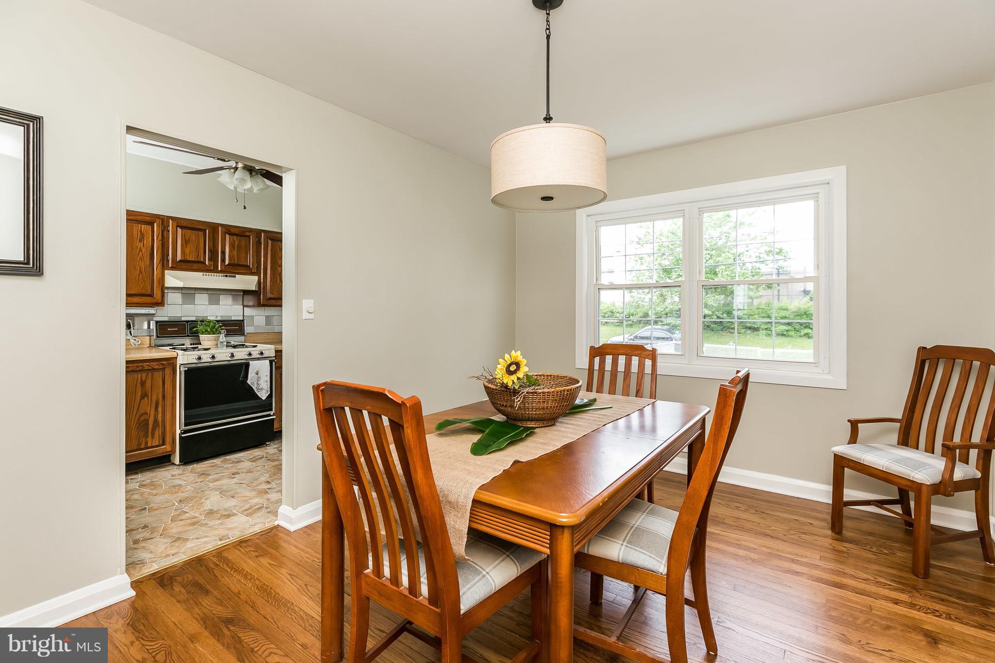 917 Southridge Road Baltimore, MD 21228 - Photo 8 of 25 Tasteful touches like this trendy chandelier