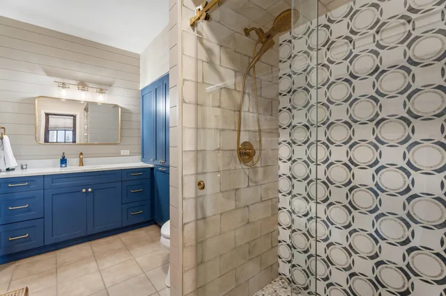 a view of a swimming pool with lounge chairs in the terrace