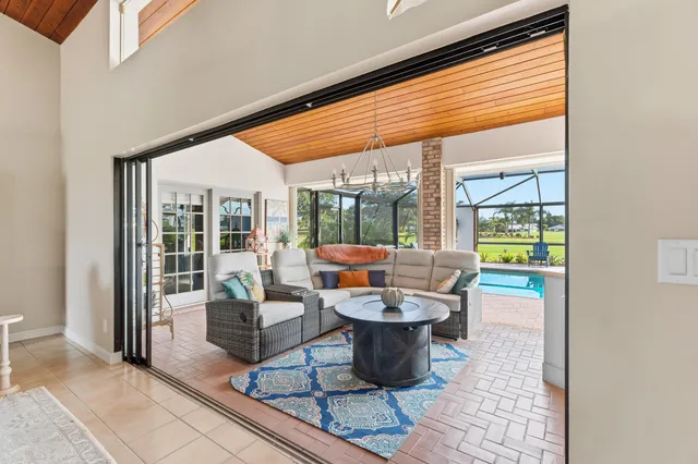 a bathroom with a sink a mirror and a shower