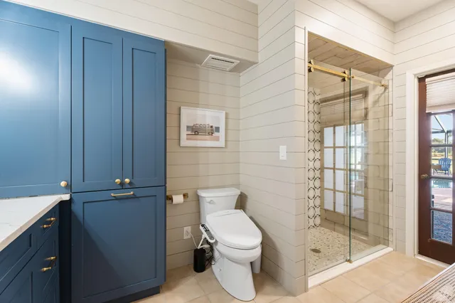 a view of a backyard with sitting area