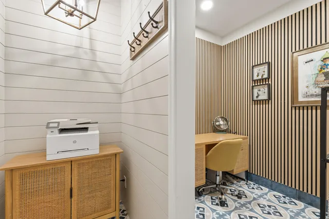 a view of a backyard with sitting area