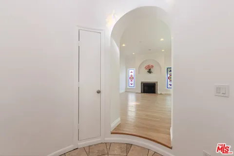 a view of a hallway with front door
