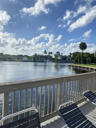 a view of a lake from a balcony