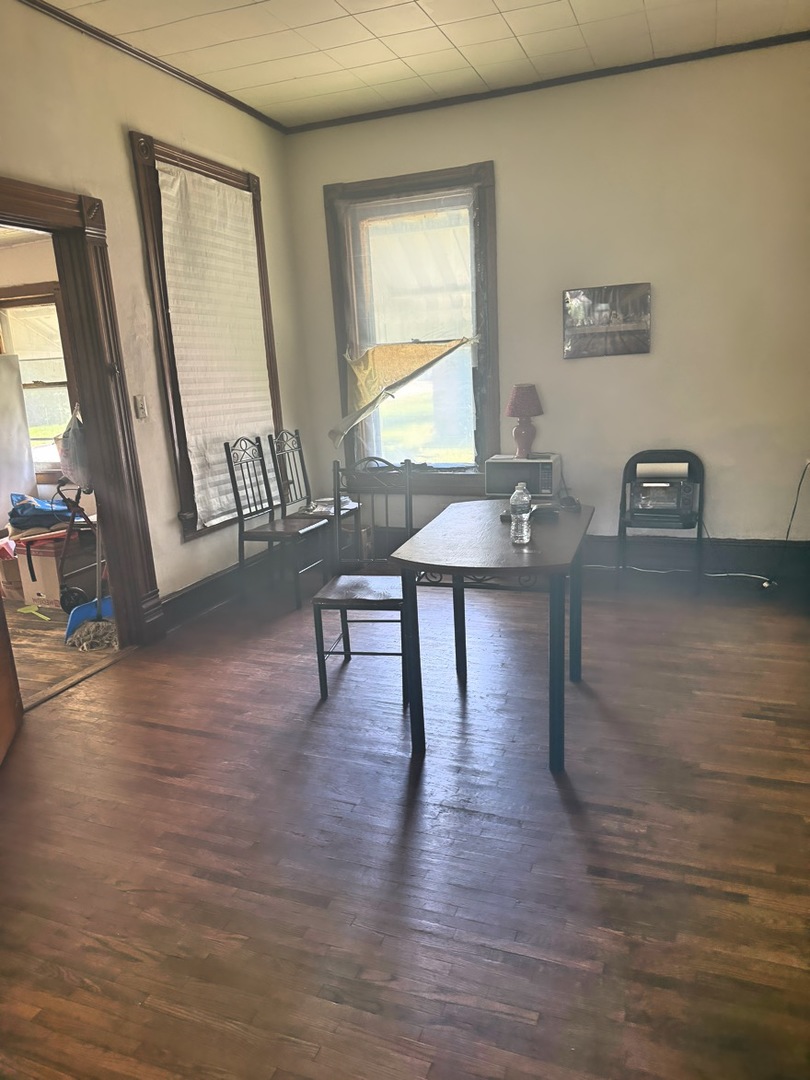 313 North 5th Street Watseka, IL 60970 - Photo 6 of 16 a view of a livingroom with furniture and wooden floor