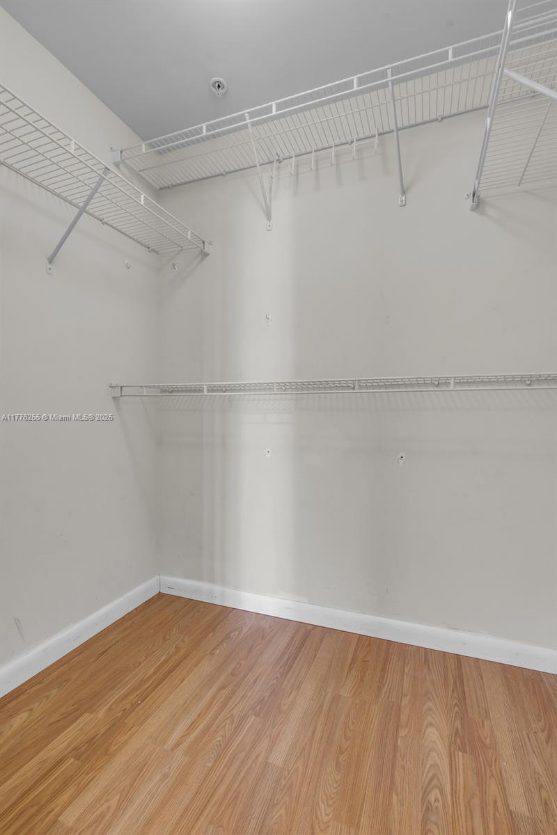 215 Southwest 42nd Avenue, Unit 402 Miami, FL 33134 - Photo 12 of 20 Bedroom 2 - walk in closet