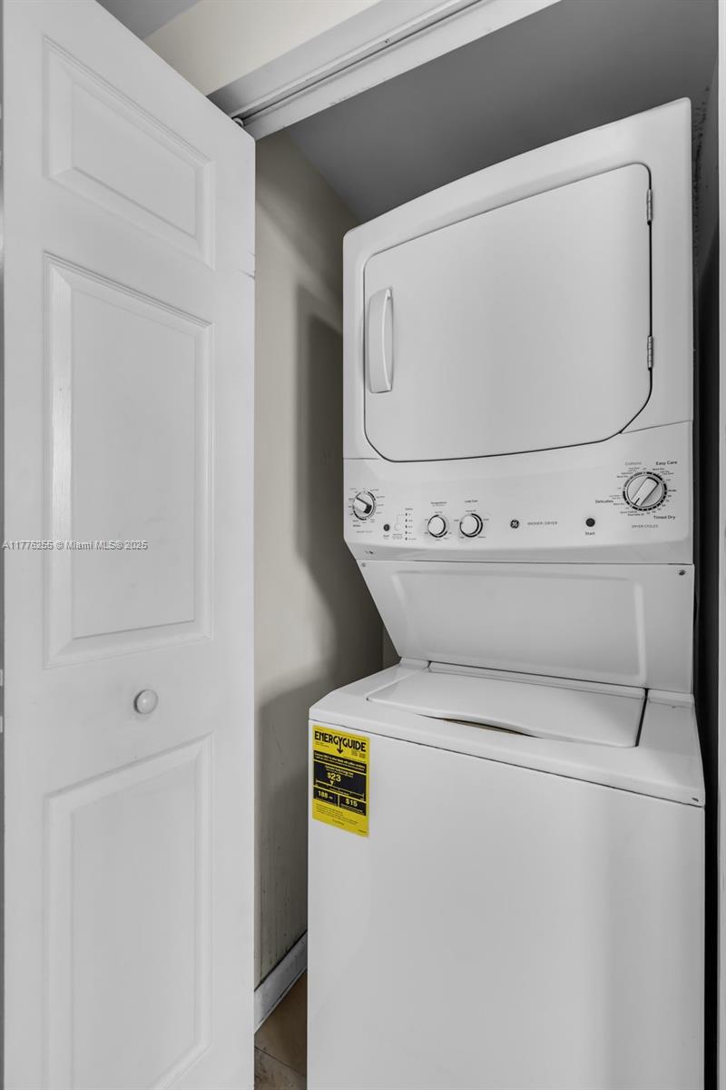 215 Southwest 42nd Avenue, Unit 402 Miami, FL 33134 - Photo 13 of 20 Washer dryer inside the unit