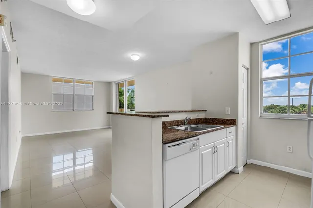 $415,000 | 215 Southwest 42nd Avenue, Unit 402, Miami, FL 33134