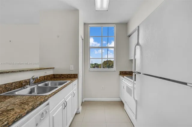 $415,000 | 215 Southwest 42nd Avenue, Unit 402, Miami, FL 33134