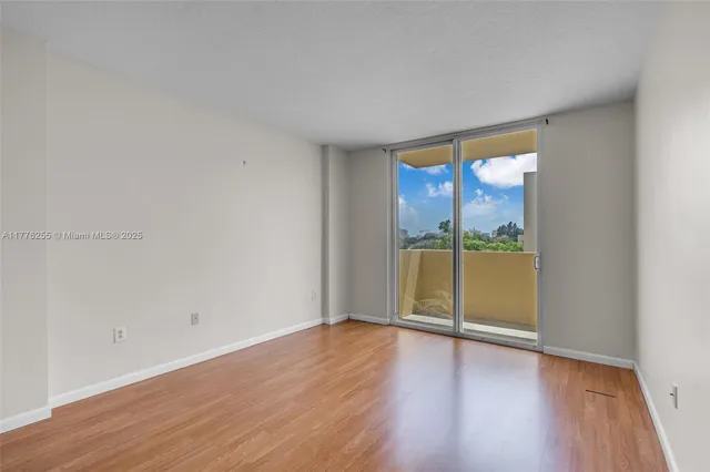 $415,000 | 215 Southwest 42nd Avenue, Unit 402, Miami, FL 33134