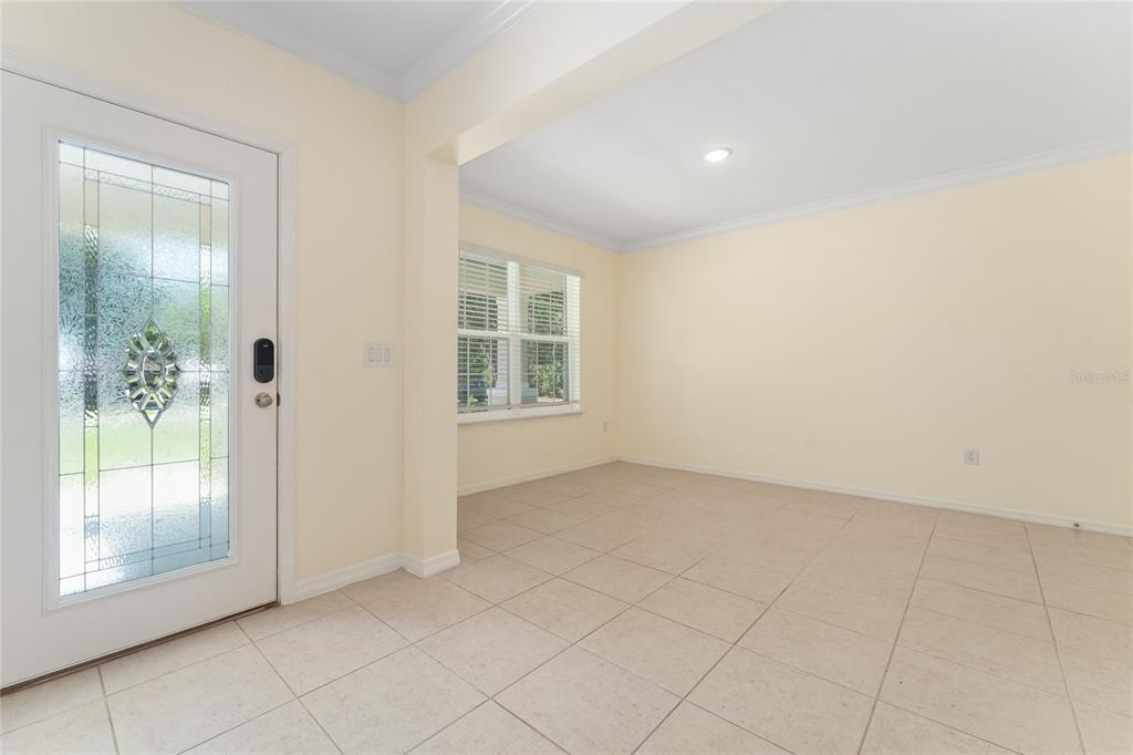 4331 Wayne Road Fruitland Park, FL 34731 - Photo 14 of 46 an empty room with windows
