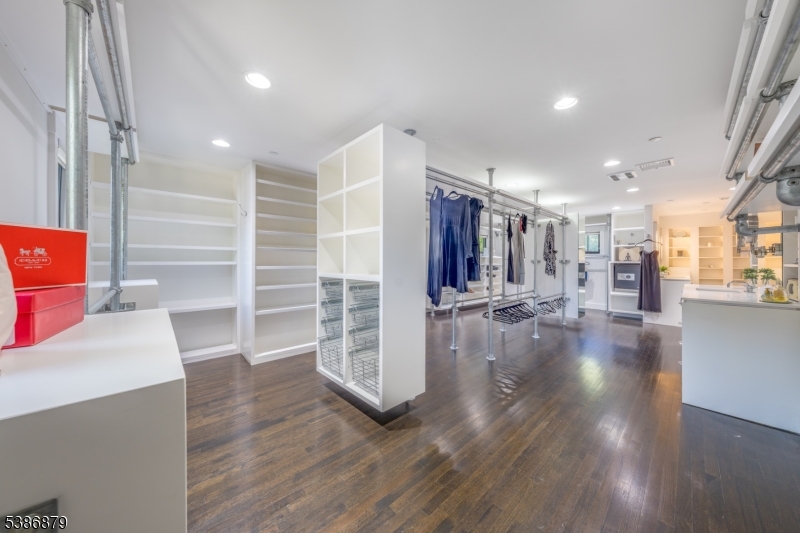 60 Fernwood Road Summit, NJ 07901 - Photo 30 of 50 a view of a room with wooden floor and windows