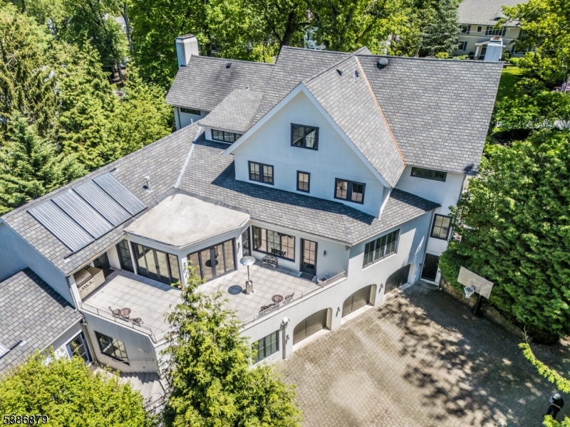 60 Fernwood Road Summit, NJ 07901 - Photo 44 of 50 an aerial view of a house with a yard and balcony