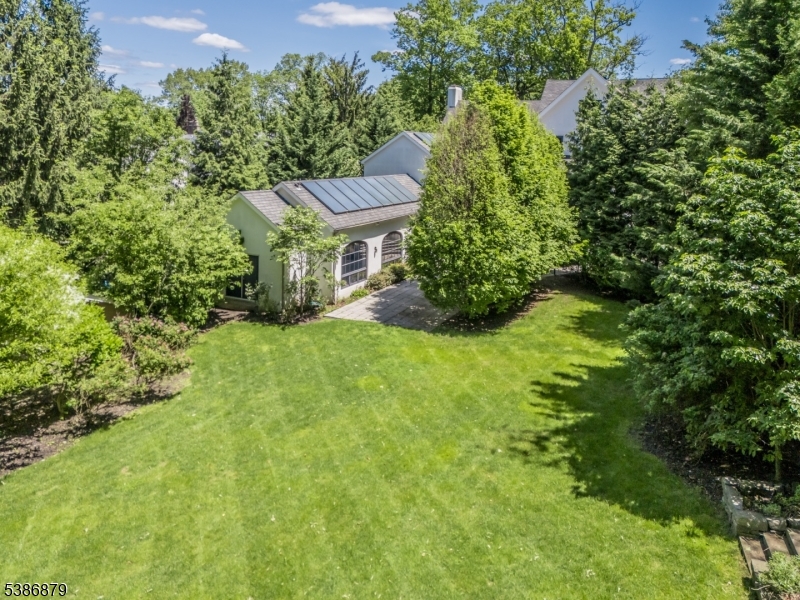 60 Fernwood Road Summit, NJ 07901 - Photo 48 of 50 a view of a house with a yard and plants