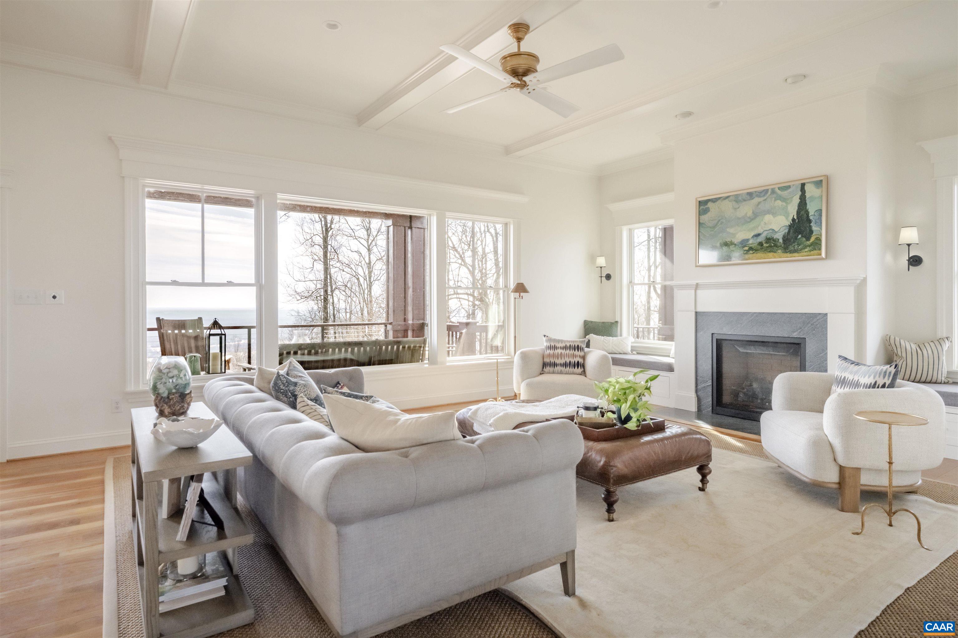 765 Summit Ridge Point Charlottesville, VA 22911 - Photo 11 of 60 a living room with furniture and a fireplace