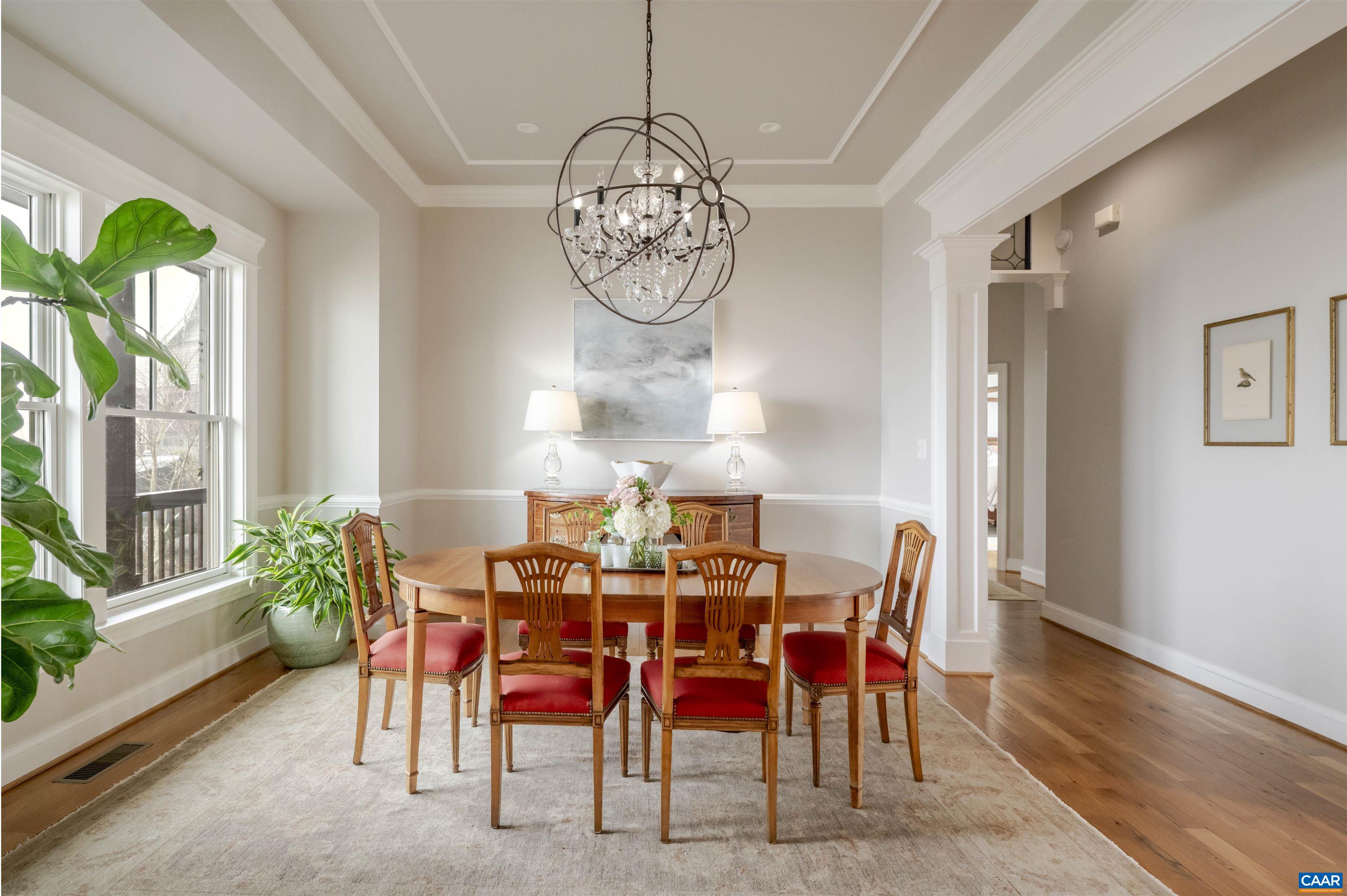 765 Summit Ridge Point Charlottesville, VA 22911 - Photo 13 of 60 a view of a dining room with furniture window and wooden floor
