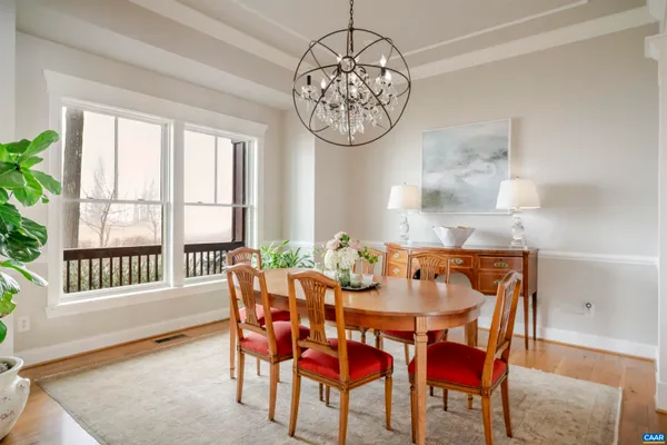 a living room with furniture window and a lamp